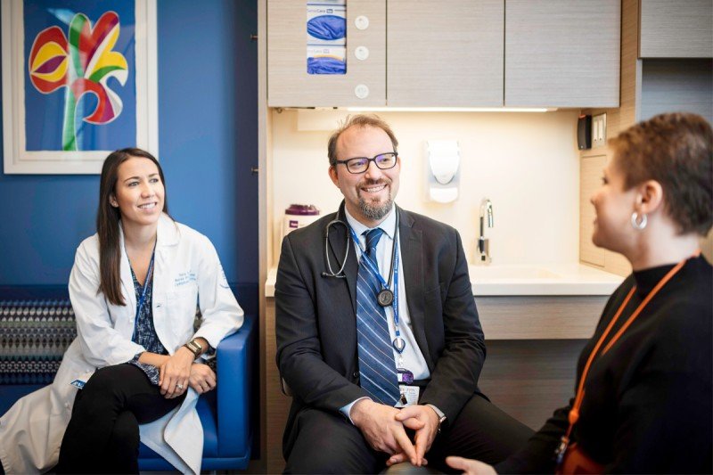 Nurse Practitioner Tara Duggan and Medical Oncologist Paul Hamlin with Patient
